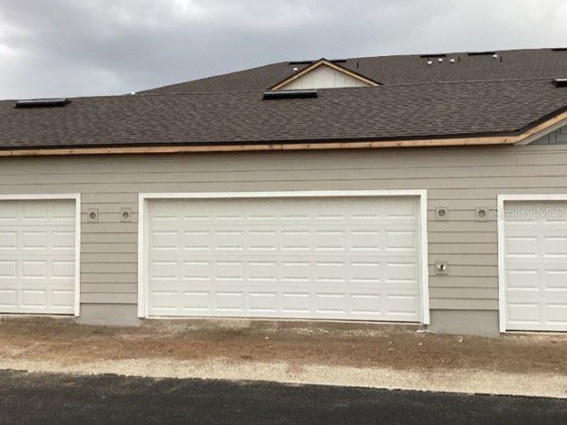 Exterior details and patio area of a home in Lake Cawood Cove, Windermere (Image 3).