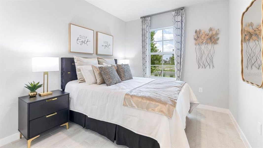 Furnished interior view inside a new home in Halifax Plantation Villas, Ormond Beach (Image 9).