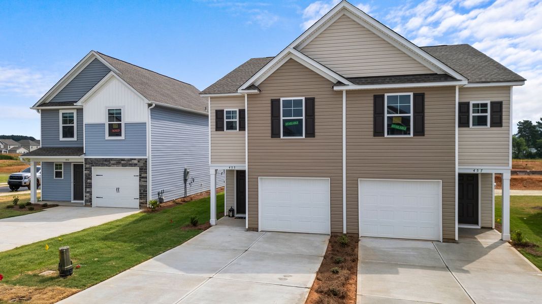 Front exterior of a new home in Champions Village at Cherry Hill, Pendleton, SC, highlighting curb appeal (Image 27).