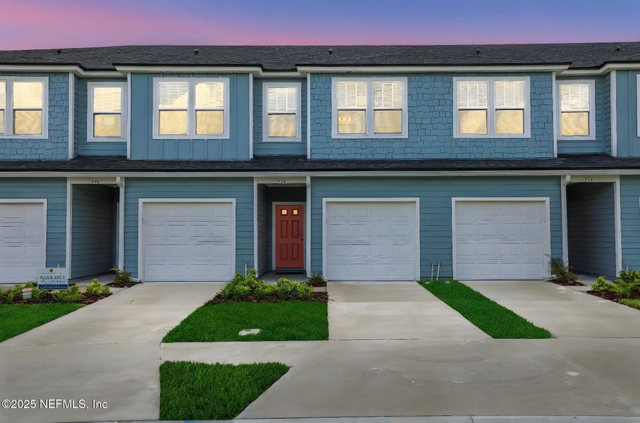 Front exterior of a new home in Kasen Oaks, Jacksonville, FL, highlighting curb appeal (Image 16).