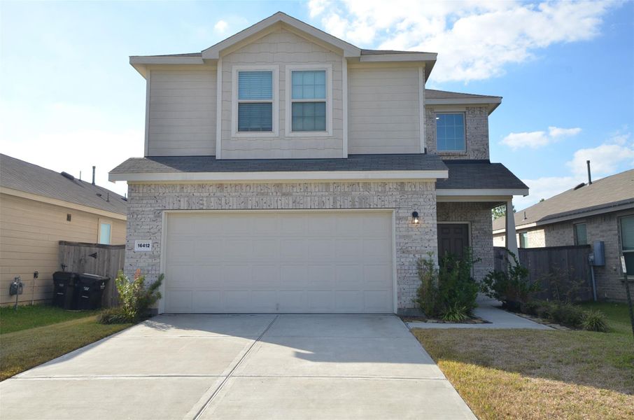 Beautiful two story home with a brick, stone and Hardi-plank exterior. It features two car garage, Beautiful two story home with a brick, stone and Hardi-plank exterior. It features two car garage,