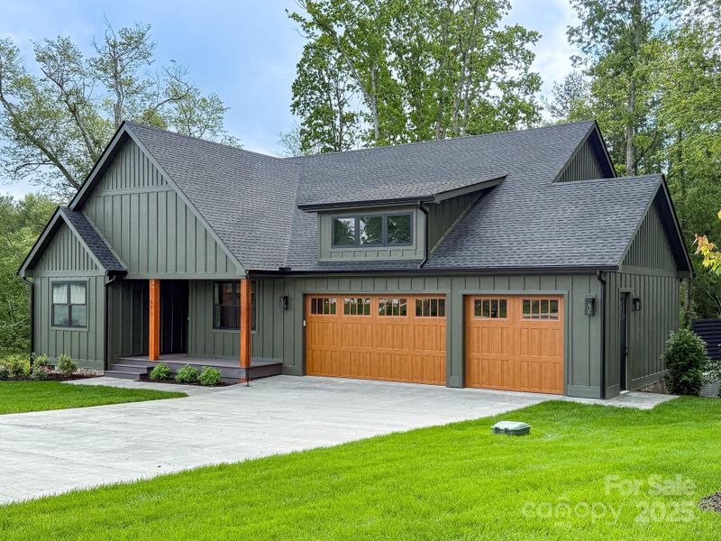 Front exterior of a new home in , Mills River, NC, highlighting curb appeal (Image 20).