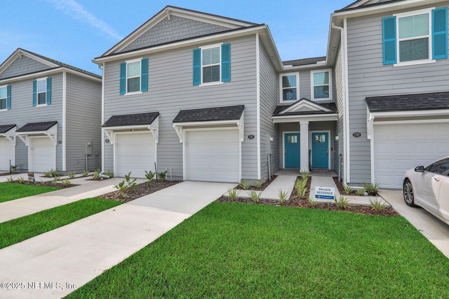 Exterior details and patio area of a home in Atlantis Pointe, Middleburg (Image 24).