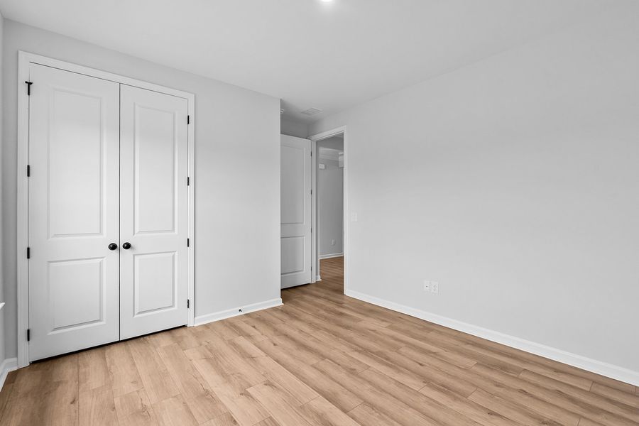 Spacious, unfurnished interior of a new home in Lilah Grove, Summerfield (Image 29).