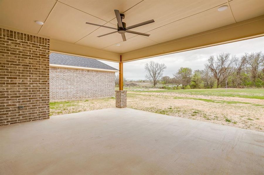 Exterior details and patio area of a home in , Poolville (Image 24).