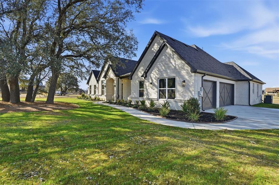 Front exterior of a new home in , Weatherford, TX, highlighting curb appeal (Image 1). Front exterior of a new home in , Weatherford, TX, highlighting curb appeal (Image 1).