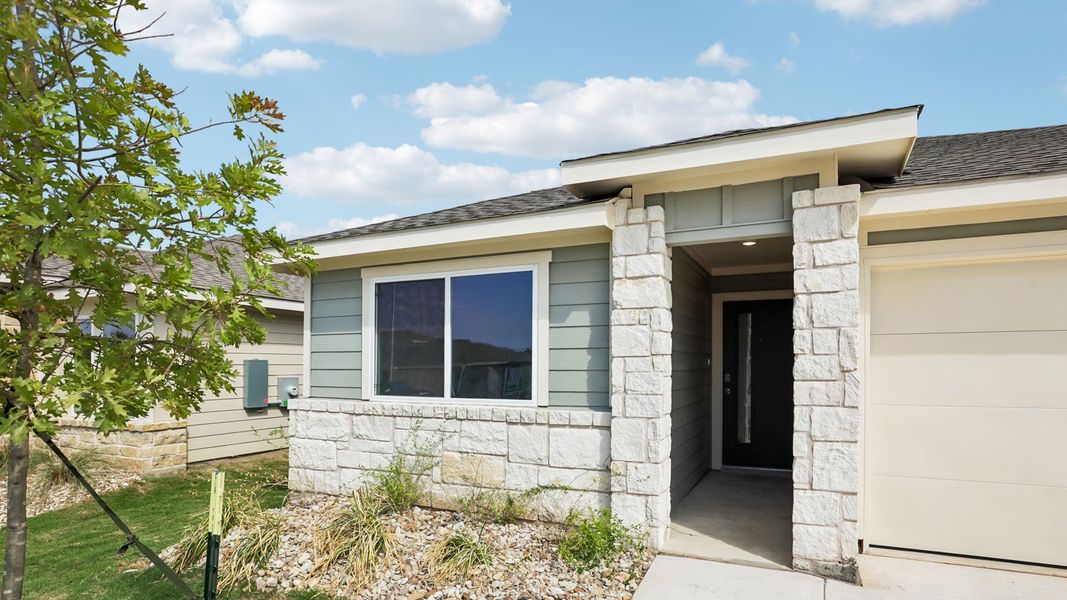 Exterior details and patio area of a home in Trails at Wildhorse, Austin (Image 3). Exterior details and patio area of a home in Trails at Wildhorse, Austin (Image 3).