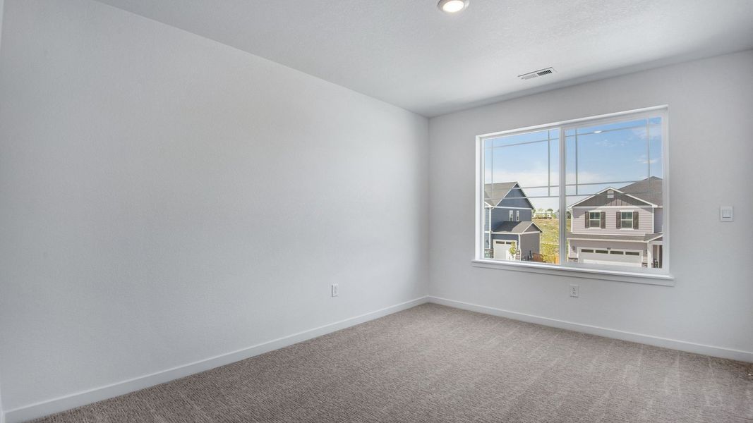 Spacious, unfurnished interior of a new home in Trails at Crowfoot, Parker (Image 41).