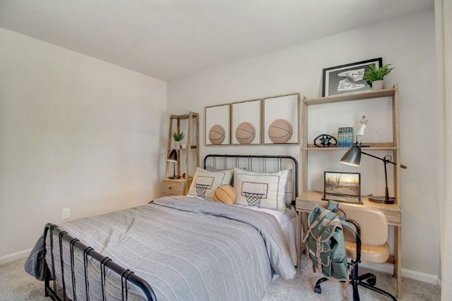 A bedroom with a bed and shelves. A bedroom with a bed and shelves.