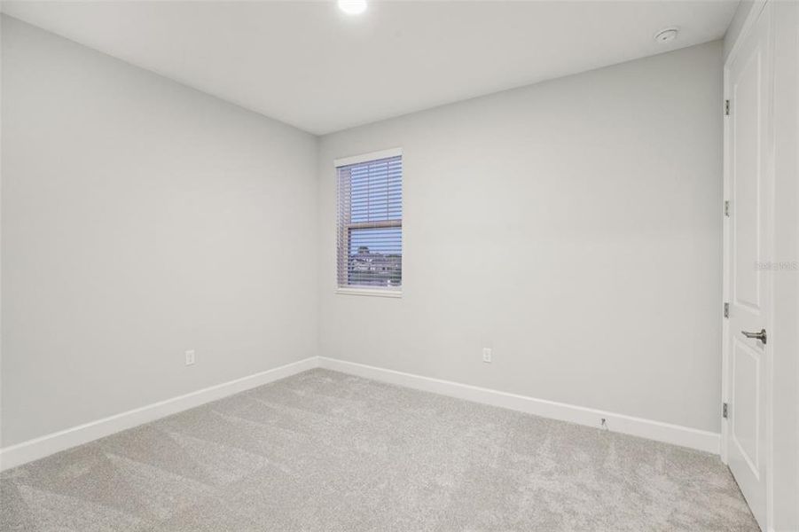 Spacious, unfurnished interior of a new home in Hawk's Overlook, Oviedo (Image 31).