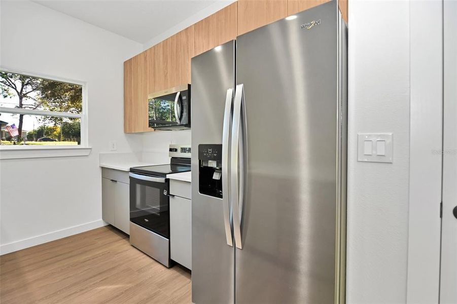 Furnished interior view inside a new home in , Dunnellon (Image 8).