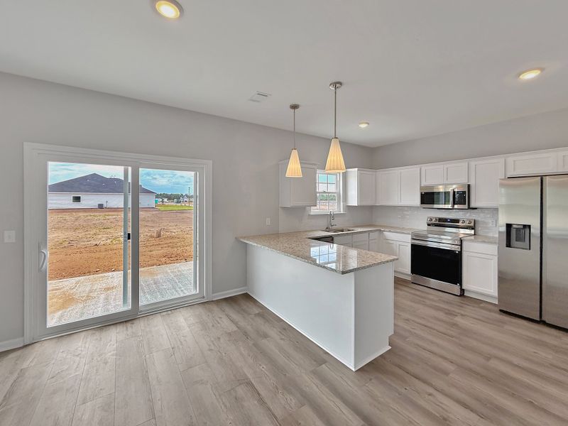Furnished interior view inside a new home in The Village at Sassafras, Allenhurst (Image 6).