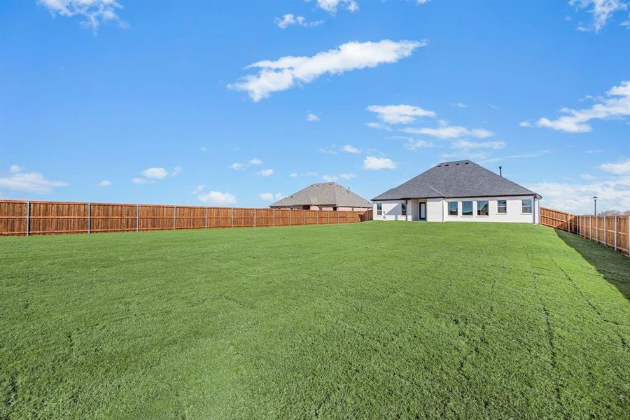 Exterior details and patio area of a home in Settlers Glen, New Fairview (Image 24).