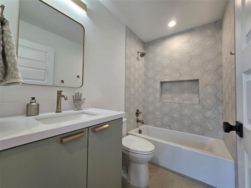 Downstairs bath with a tub. Toilet has the electric pre-wire/outlet for a future bidet install.