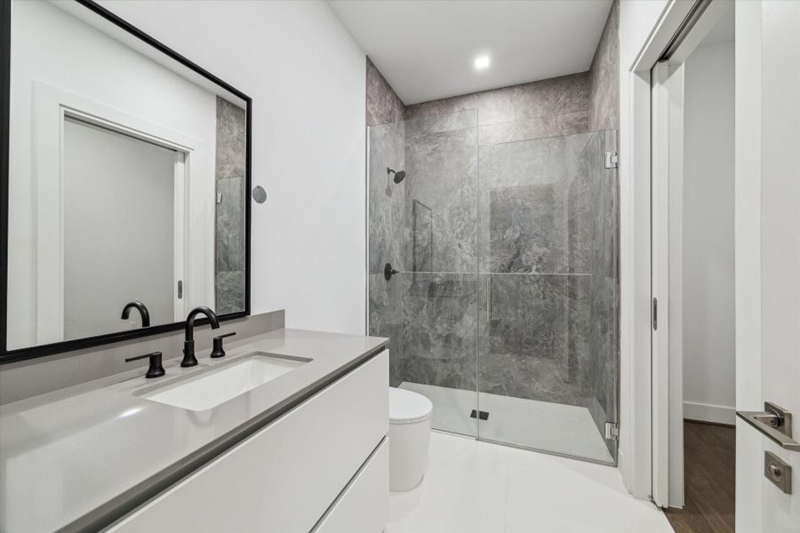 Furnished interior view inside a new home in Residences At The Allen, Houston (Image 28). Furnished interior view inside a new home in Residences At The Allen, Houston (Image 28).