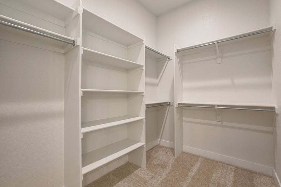 Primary Closet - Not Actual Home - Finishes May Vary