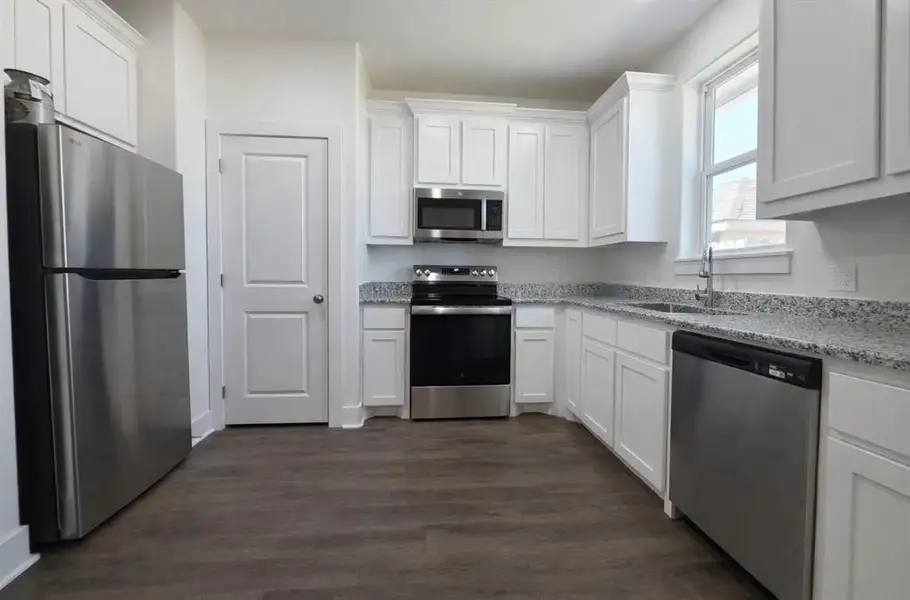 Furnished interior view inside a new home in , Denison (Image 4).