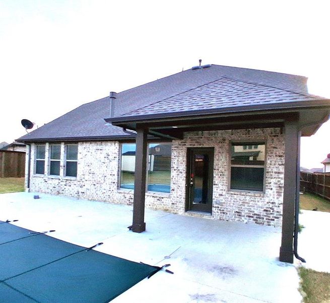 Exterior details and patio area of a home in , Royse City (Image 3).