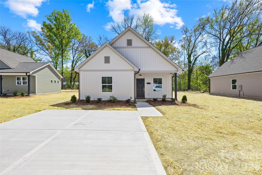 Front exterior of a new home in , Rock Hill, SC, highlighting curb appeal (Image 23).