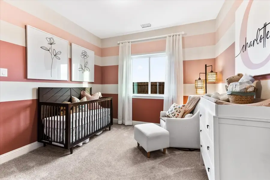 Furnished interior view inside a new home in The Reserve at Spiritas Ranch, Little Elm (Image 18).