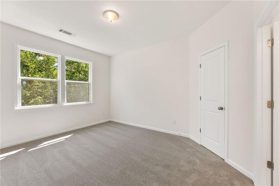 Spacious, unfurnished interior of a new home in Chattahoochee Reserve, Cumming (Image 60).