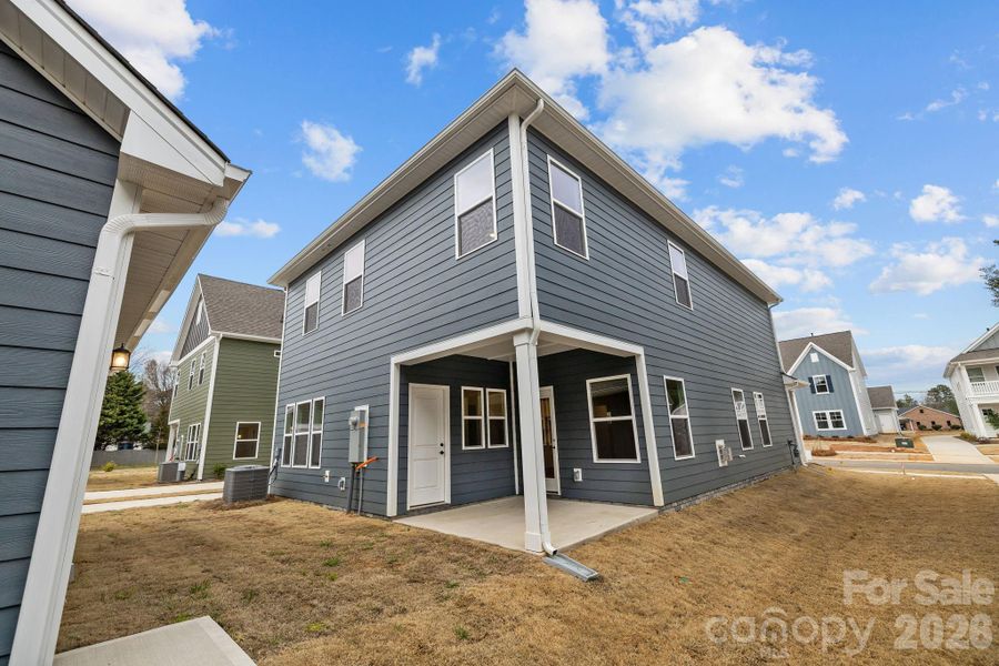 Exterior details and patio area of a home in Arbor Village, Matthews (Image 28).