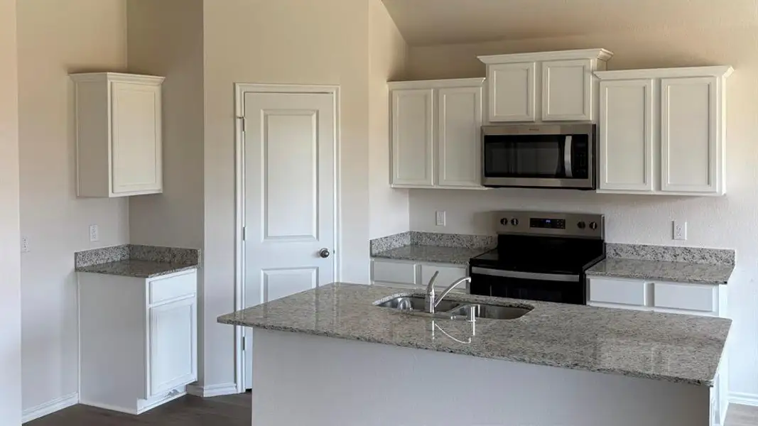 Furnished interior view inside a new home in Stonewyck Farms, Ennis (Image 5).