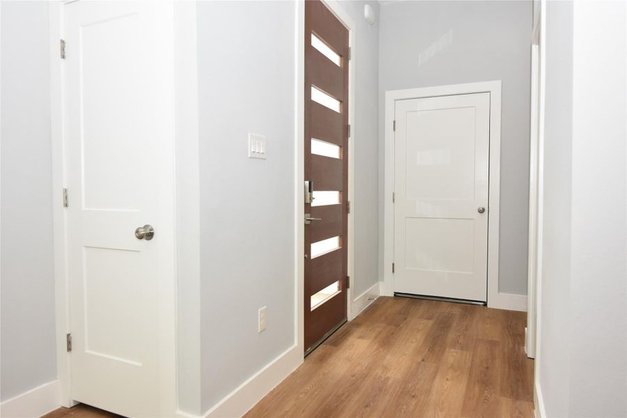 Front door entrance into foyer area Front door entrance into foyer area