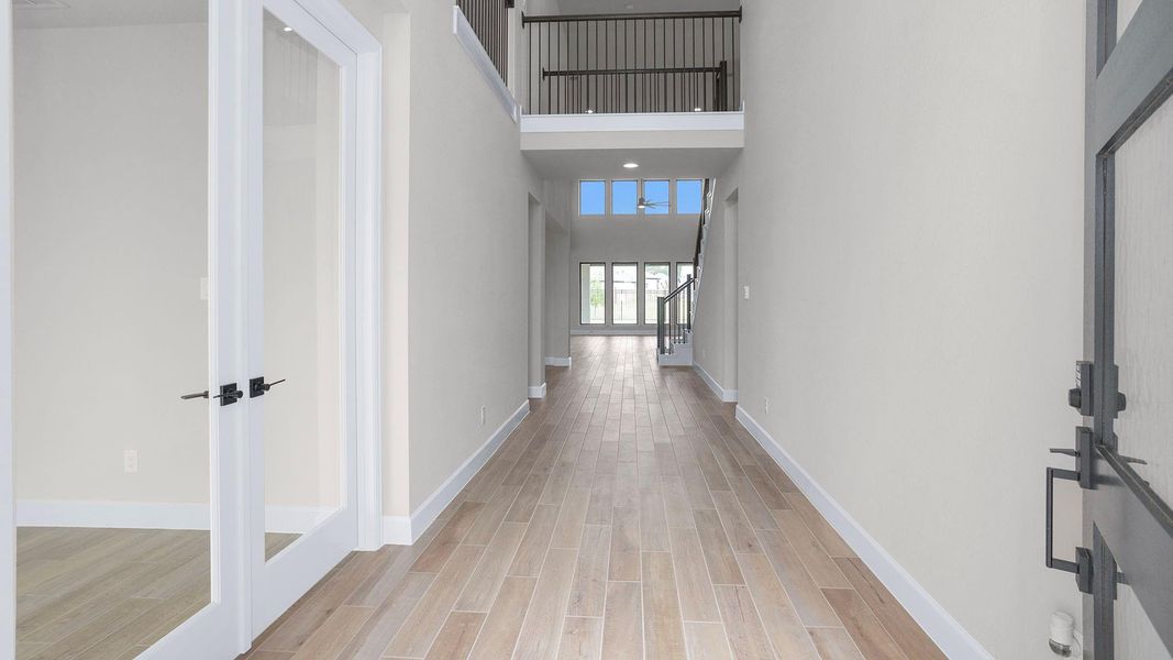 Spacious, unfurnished interior of a new home in Artavia 55' - Valencia, Conroe (Image 13). Spacious, unfurnished interior of a new home in Artavia 55' - Valencia, Conroe (Image 13).