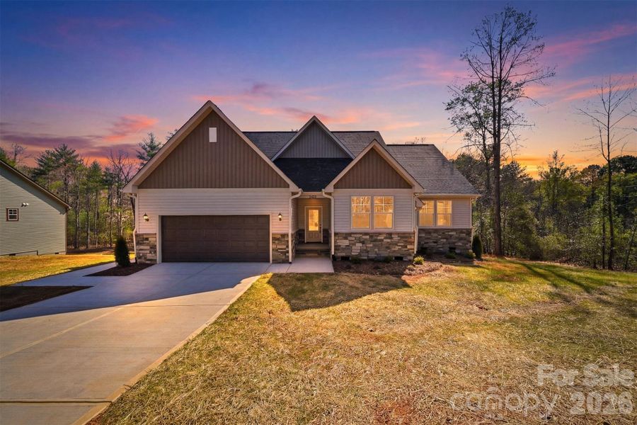 Front exterior of a new home in , Morganton, NC, highlighting curb appeal (Image 27).