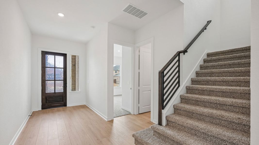 Spacious, unfurnished interior of a new home in The Enclave at Bar W Ranch, Leander (Image 16).