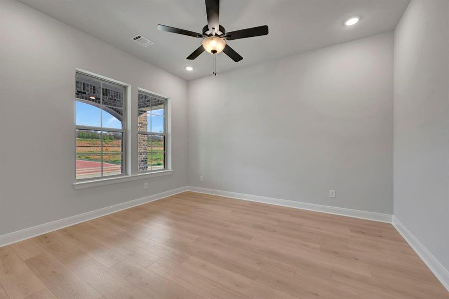 Unfurnished room featuring recessed lighting, ceiling fan, and light wood-style flooring