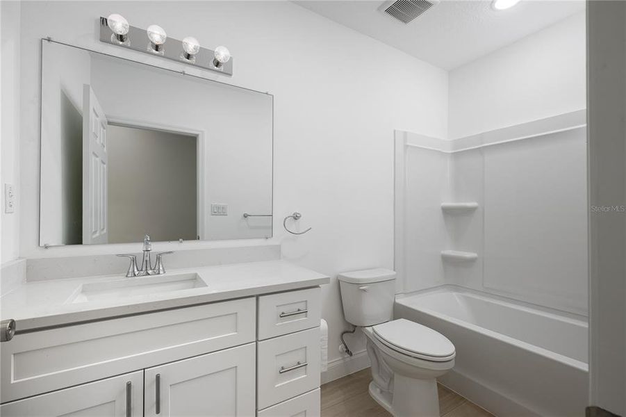 Furnished interior view inside a new home in , Deland (Image 12).