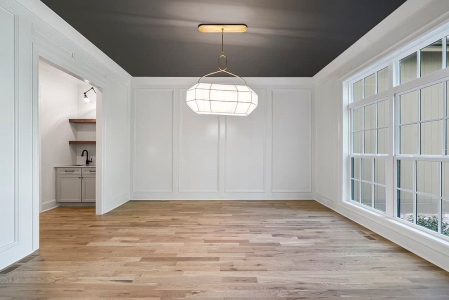 Representative unfurnished interior of a home built from the Lakeview Manor by Homes by Dickerson in Blanton's Grove, Wake Forest (Image 10).