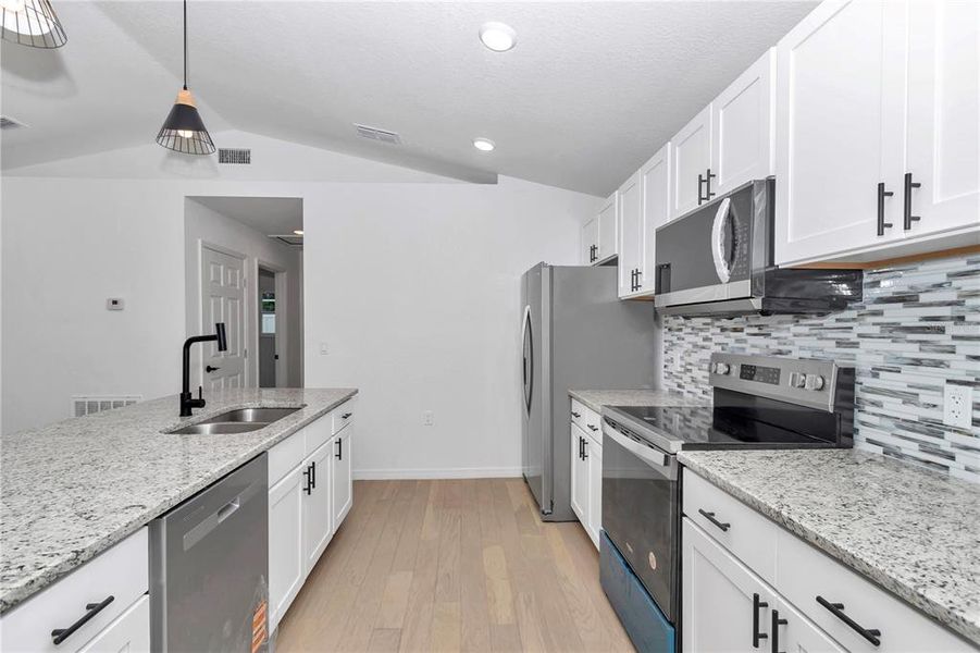 Furnished interior view inside a new home in , Dunnellon (Image 4).