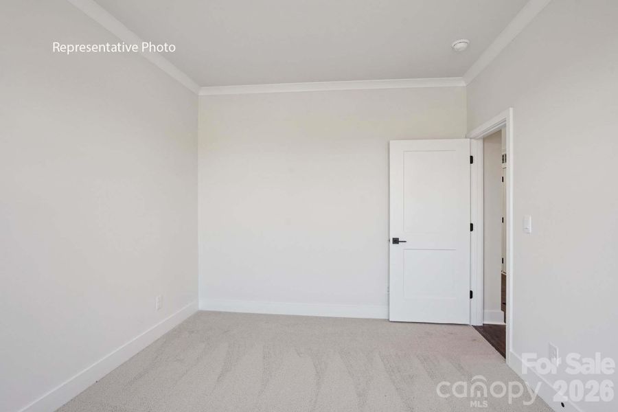 Spacious, unfurnished interior of a new home in Sanctuary at Southgate, Indian Trail (Image 21).