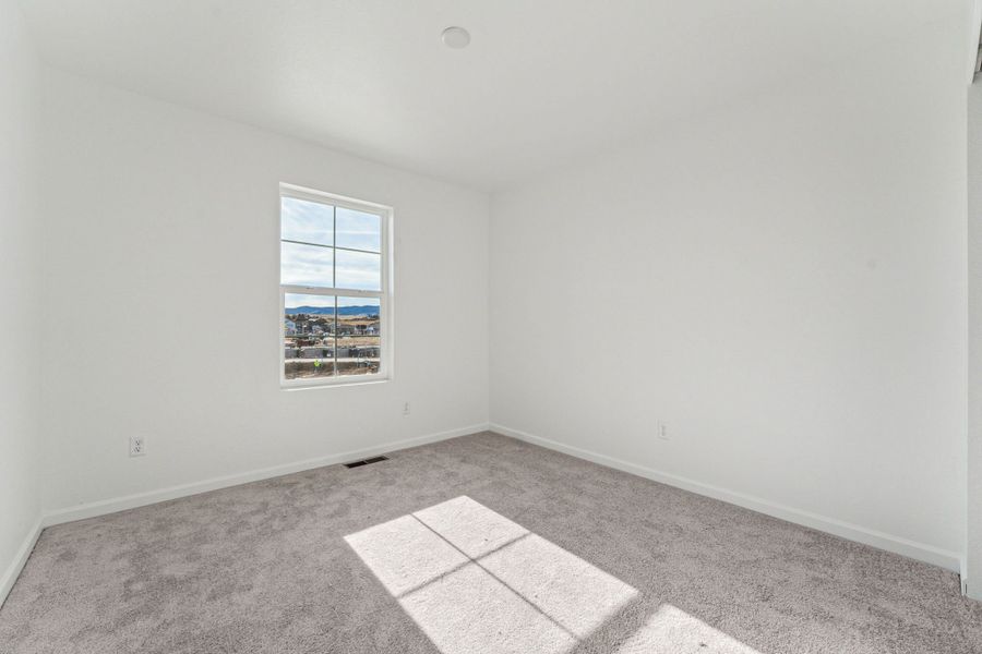 Spacious, unfurnished interior of a new home in Trailstone, Arvada (Image 29).