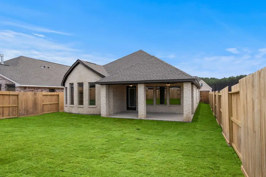 Exterior details and patio area of a home in The Highlands 45', Porter (Image 4).