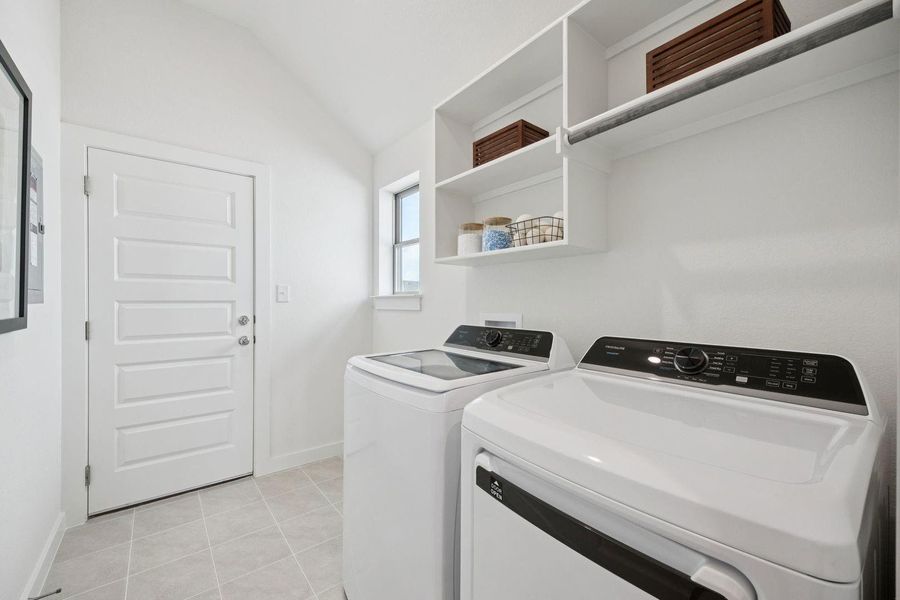 Utility Room in the Diamond home plan by Trophy Signature Homes – REPRESENTATIVE PHOTO