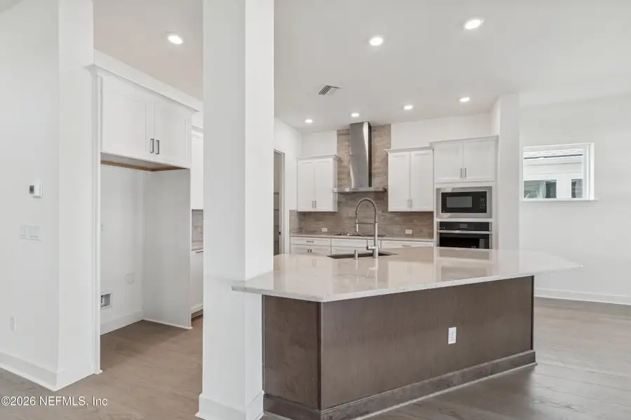 Furnished interior view inside a new home in Evergreen Island at Silverleaf - Executive, St. Augustine (Image 7).