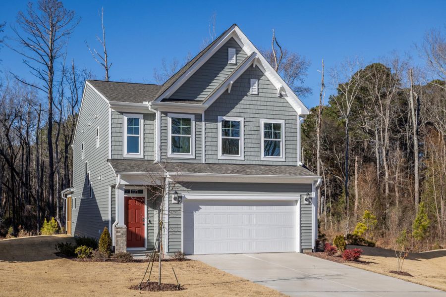 Front exterior of a new home in Daniel Farms, Benson, NC, highlighting curb appeal (Image 2). Front exterior of a new home in Daniel Farms, Benson, NC, highlighting curb appeal (Image 2).