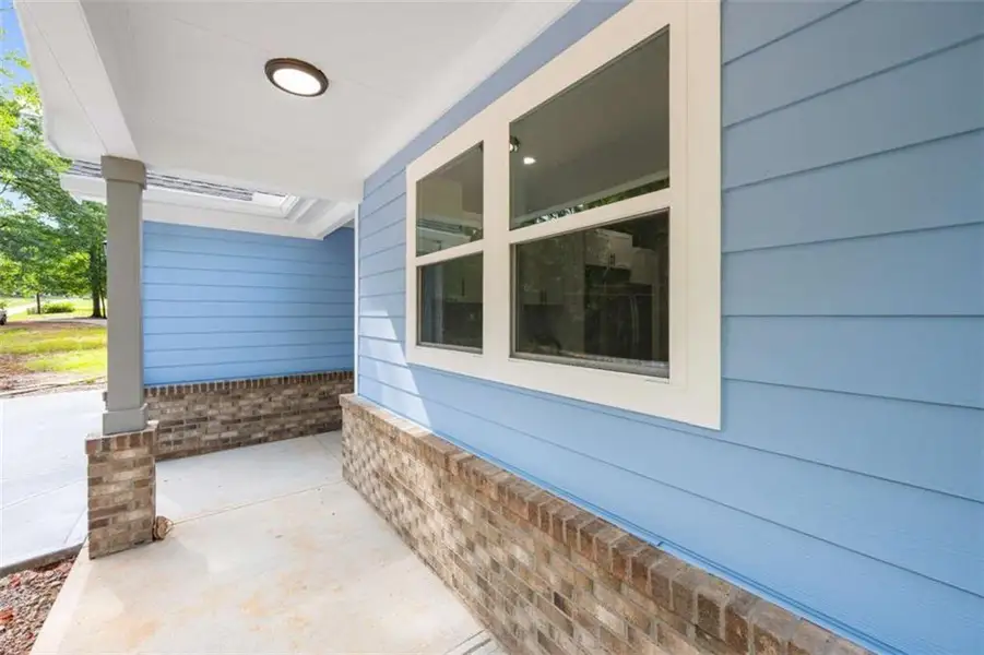 Exterior details and patio area of a home in , Commerce (Image 30).