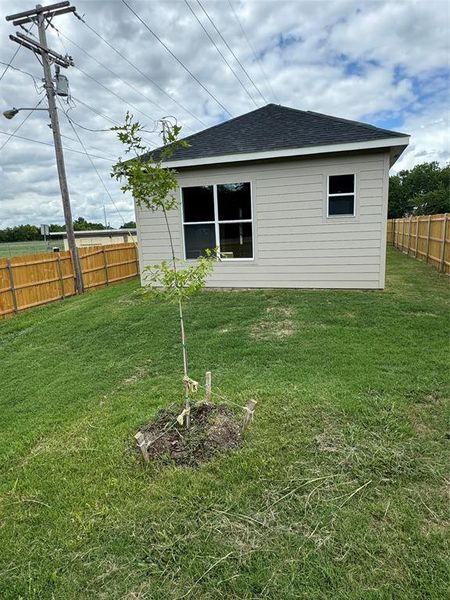 Back yard for children's play area Or to walk your dogs