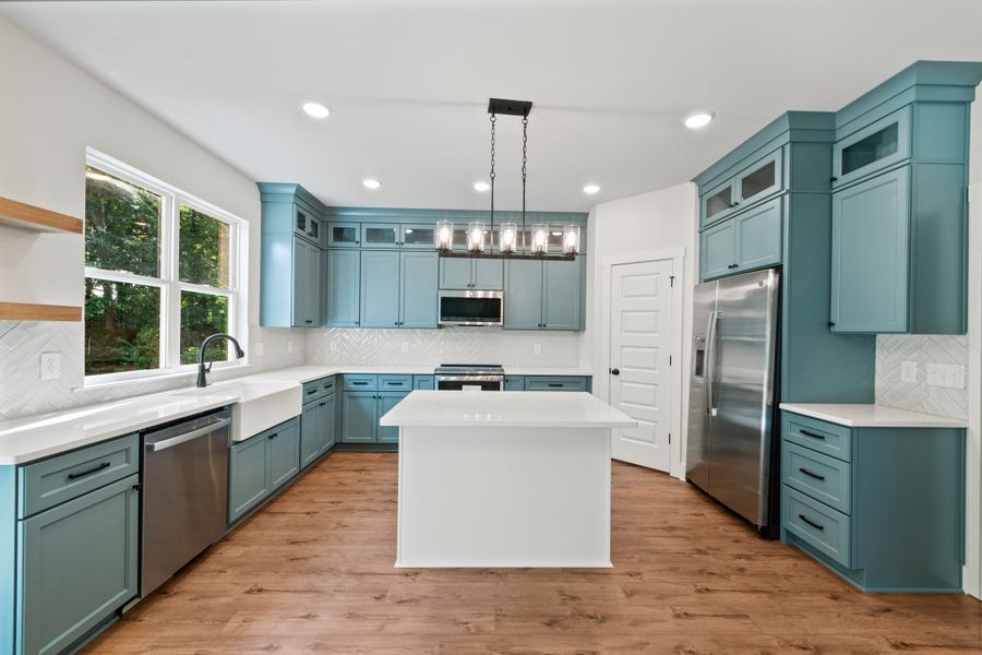 Representative furnished interior of a home built from the Two Story Farmhouse by Norfleet Builders in Cambria, White House (Image 8).