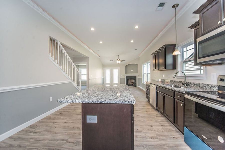 Image 40 representing the Quincy by Enchanted Homes in Hampshire Heights, Moore, SC.