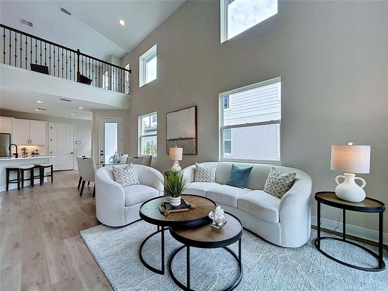 Furnished interior view inside a new home in The Towns At Long Bayou, Seminole (Image 5).