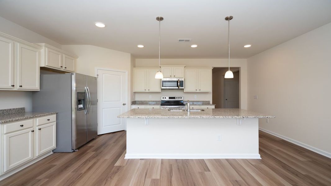 Representative furnished interior of a home built from the CALI by D.R. Horton in Lochaven, Conway (Image 9).