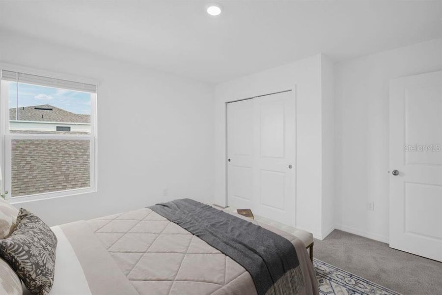 Furnished interior view inside a new home in Cove at Coasterra, Palmetto (Image 32).