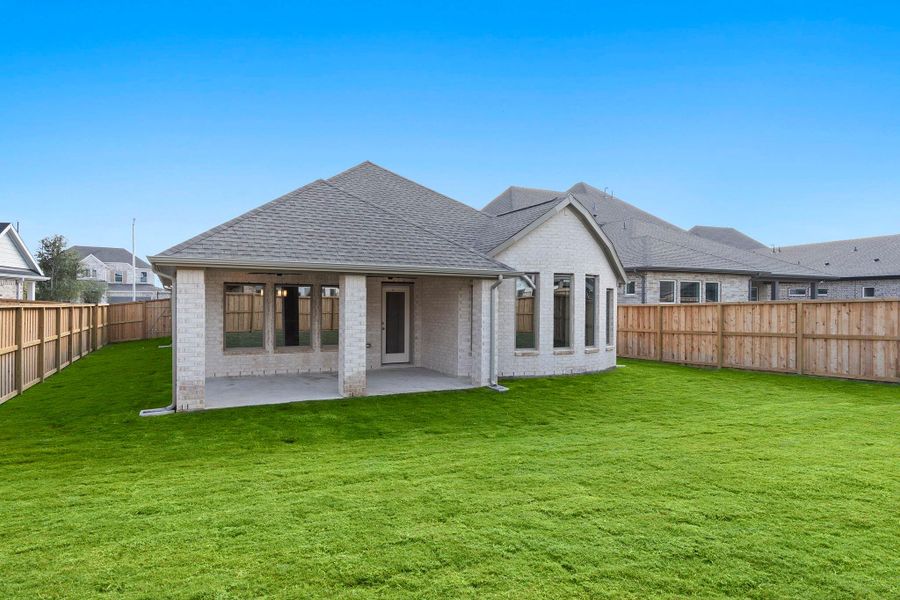 Exterior details and patio area of a home in Dunham Pointe 50', Cypress (Image 23).