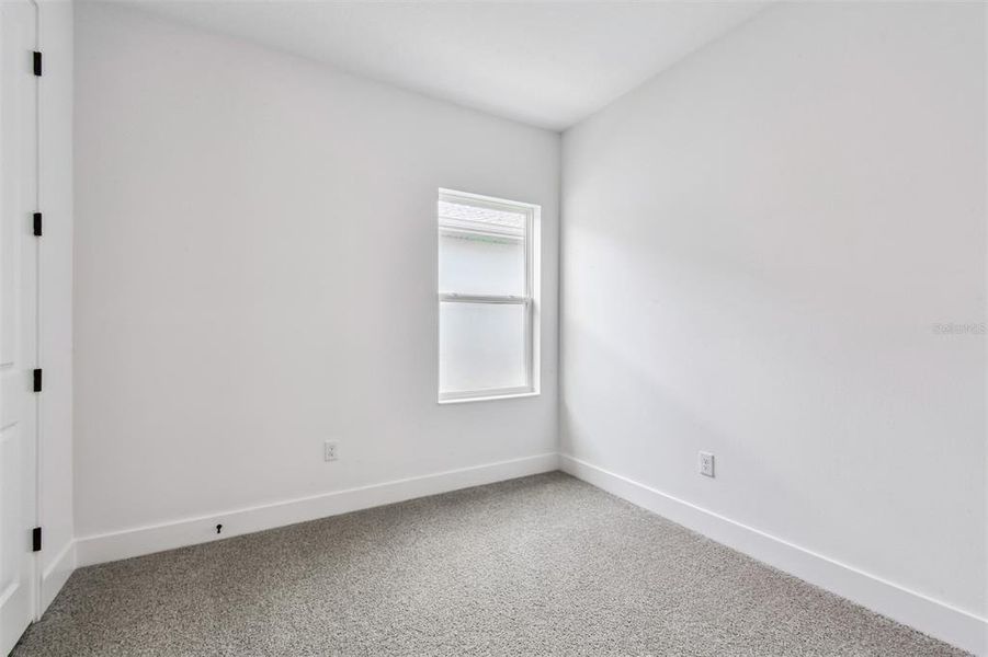 Spacious, unfurnished interior of a new home in The Peninsula at Rhodine Lake, Riverview (Image 26).